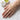 Glossy Skin Monarch Pigment Booster Formula balm spread on hand for photo finish